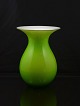 Holmegård vase, opalhvid med grønt omfangsglas. 
Solgt